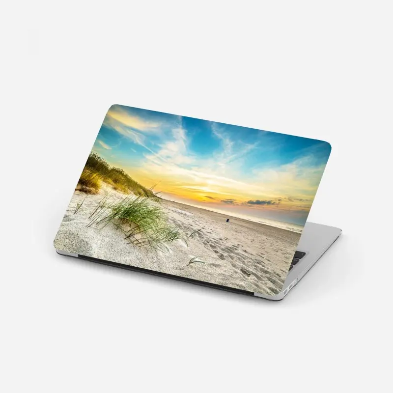 Laptop-Aufkleber sonnenuntergang über ruhigen dünen