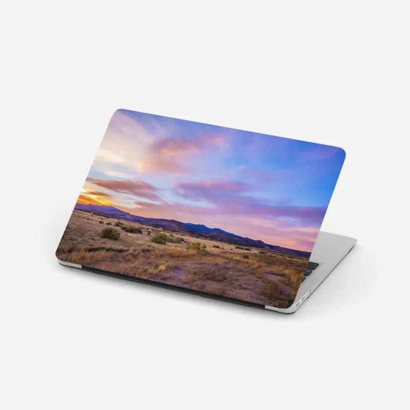Laptop-Aufkleber pastellsonnenuntergang über wüstenbergen