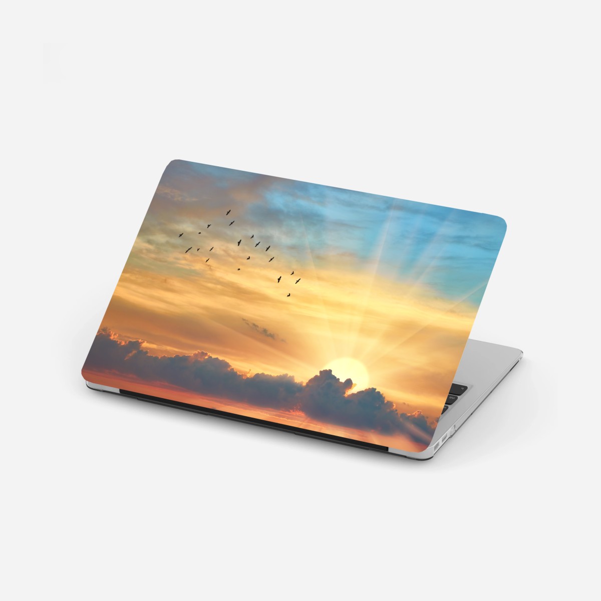 Laptop-Aufkleber goldener sonnenaufgang über den wolken – Pixers®