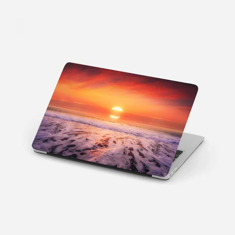 Laptop-Aufkleber goldener sonnenuntergang über ruhigem strand