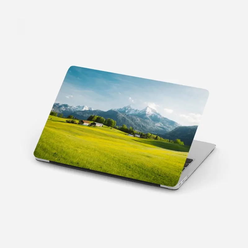 Laptop-Aufkleber alpwiese unter schneebedeckten gipfeln