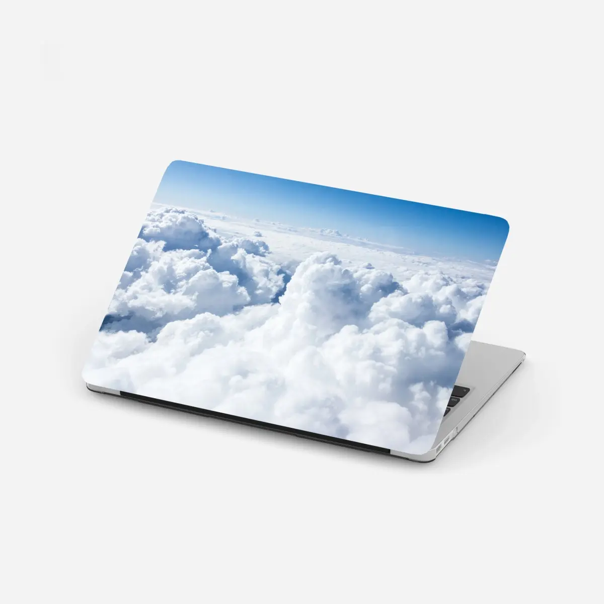 Laptop-Aufkleber blick von oben: sanfte wolken und blauer himmel – Pixers®