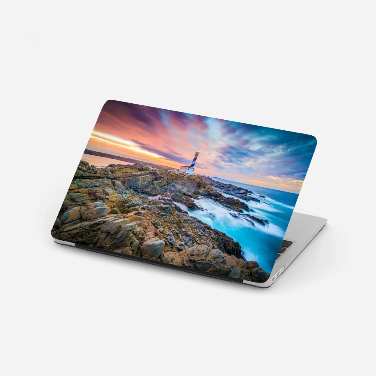 Laptop-Aufkleber sonnenuntergang bei leuchtturm Favaritx, Menorca – Pixers®
