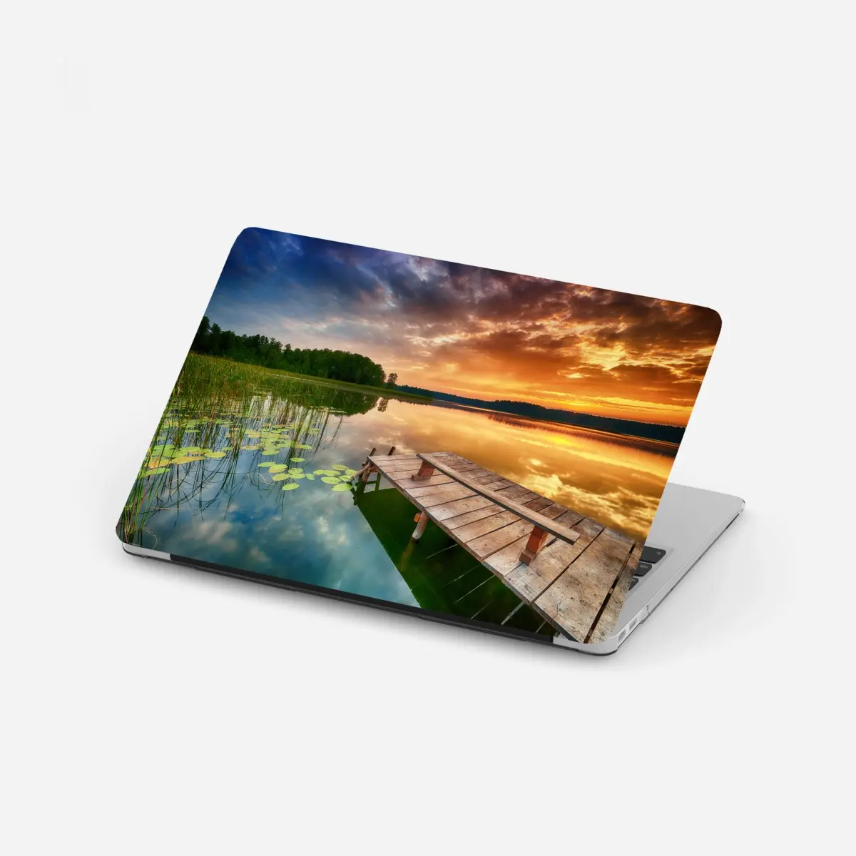 Laptop-Aufkleber goldener sonnenaufgang über ruhigem see – Pixers®