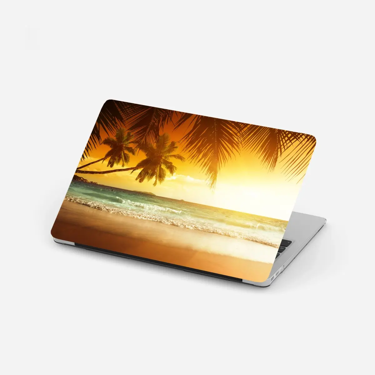 Laptop-Aufkleber goldener sonnenuntergang an einem strand in der Karibik – Pixers®