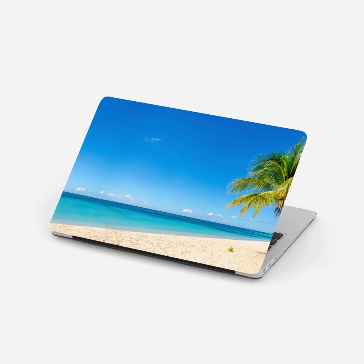 Laptop-Aufkleber tropischer strand mit türkiswasser und palme – Pixers®