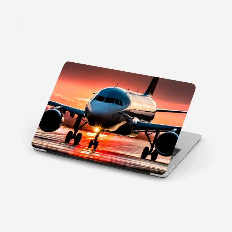 Laptop-Aufkleber jet im sonnenuntergang auf der startbahn