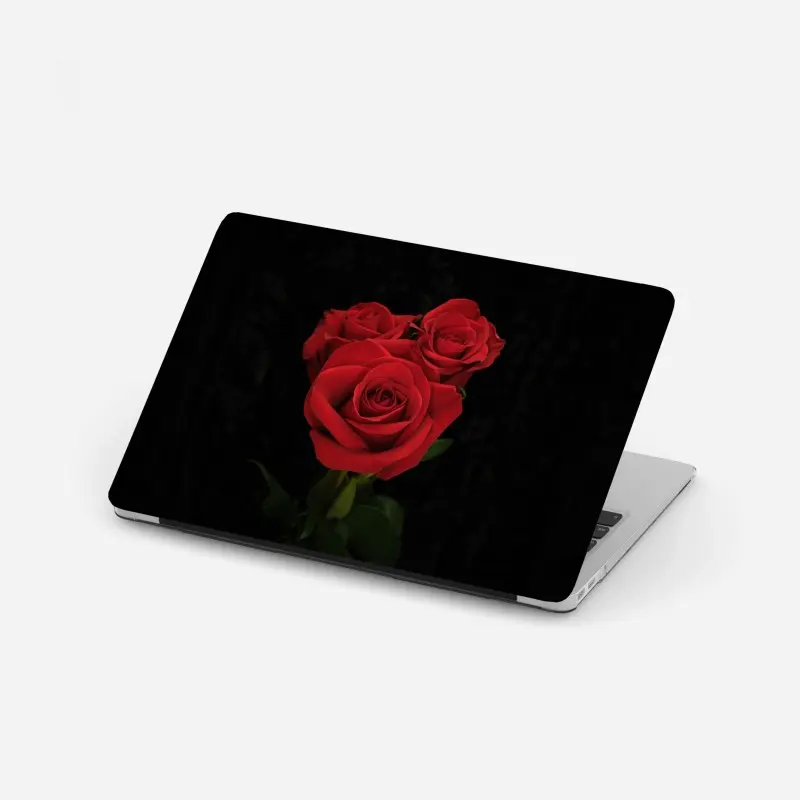 Laptop-Aufkleber rote rosen vor schwarzem hintergrund