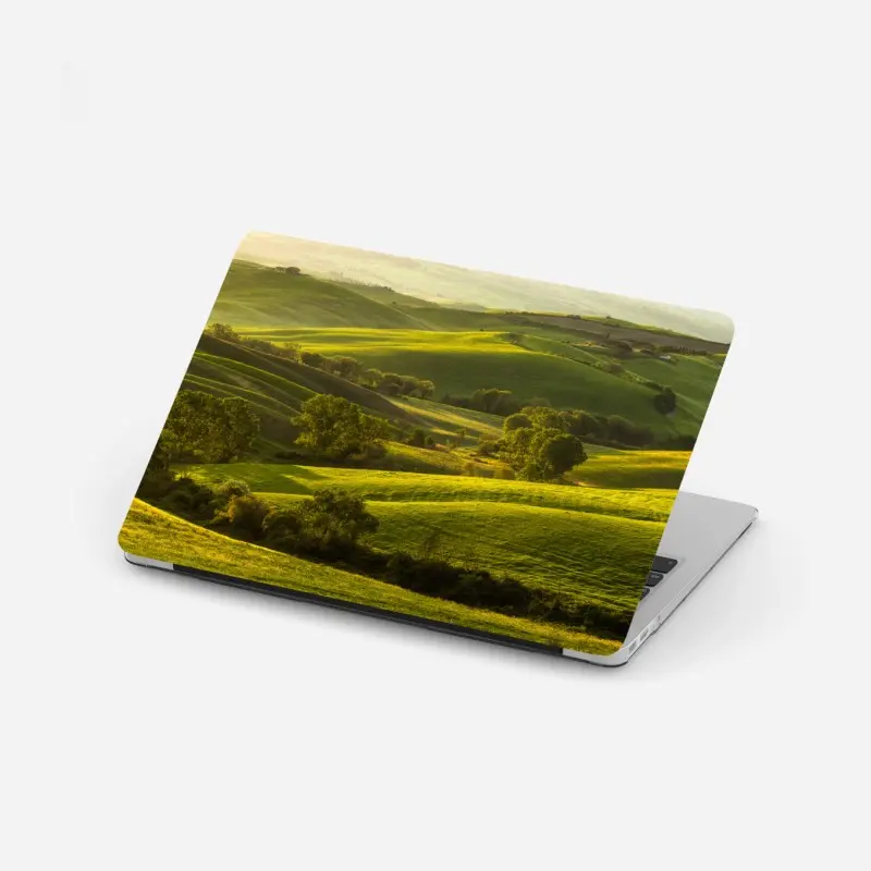 Laptop-Aufkleber sonnenbeschienene grüne hügel