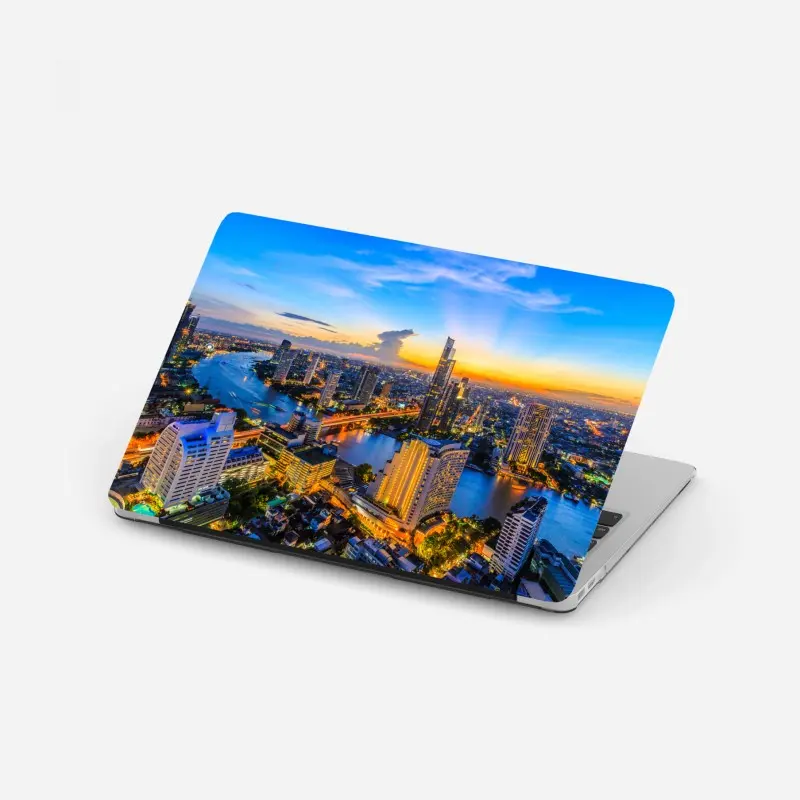 Laptop-Aufkleber lebendige stadtskyline bei dämmerung