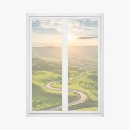 Fensteraufkleber goldener sonnenuntergang über einer geschwungenen landstraße – Pixers®