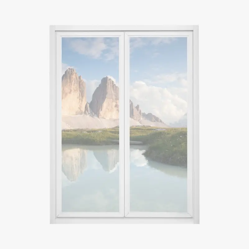 Fensteraufkleber sonnenbeschienene alpengipfel im spiegel des ruhigen sees