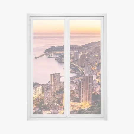 Fensteraufkleber sonnenuntergang über der städtischen küstenlinie – Pixers®