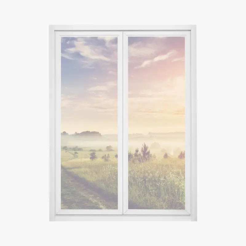 Fensteraufkleber nebeliger sonnenaufgang über einer ländlichen wiese