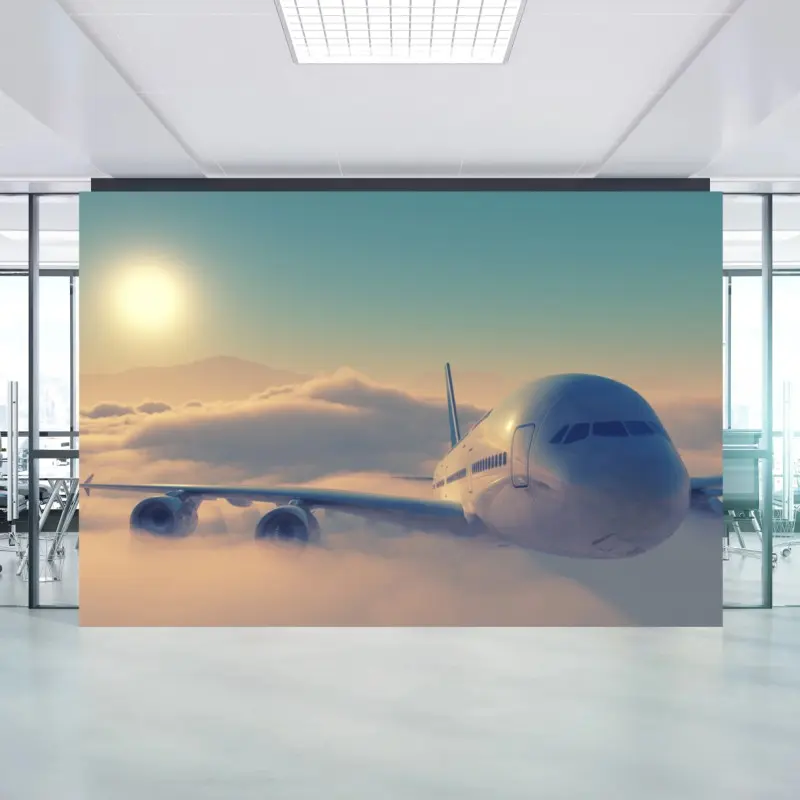 Fototapete flugzeug über den wolken im morgengrauen