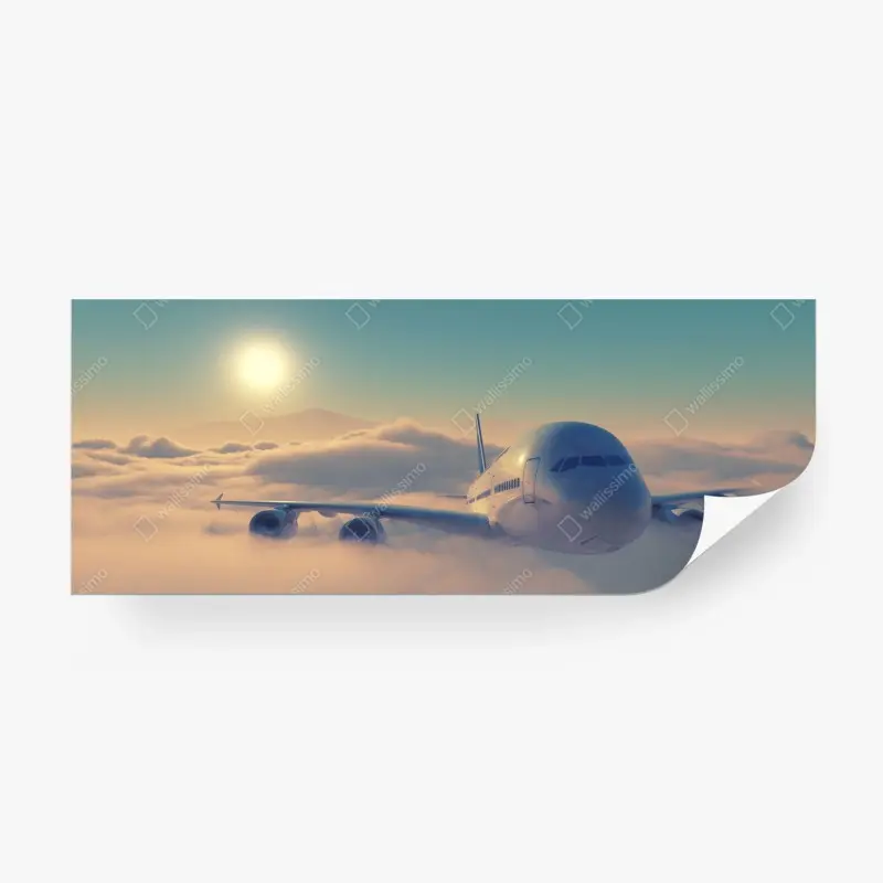 Fototapete flugzeug über den wolken im morgengrauen