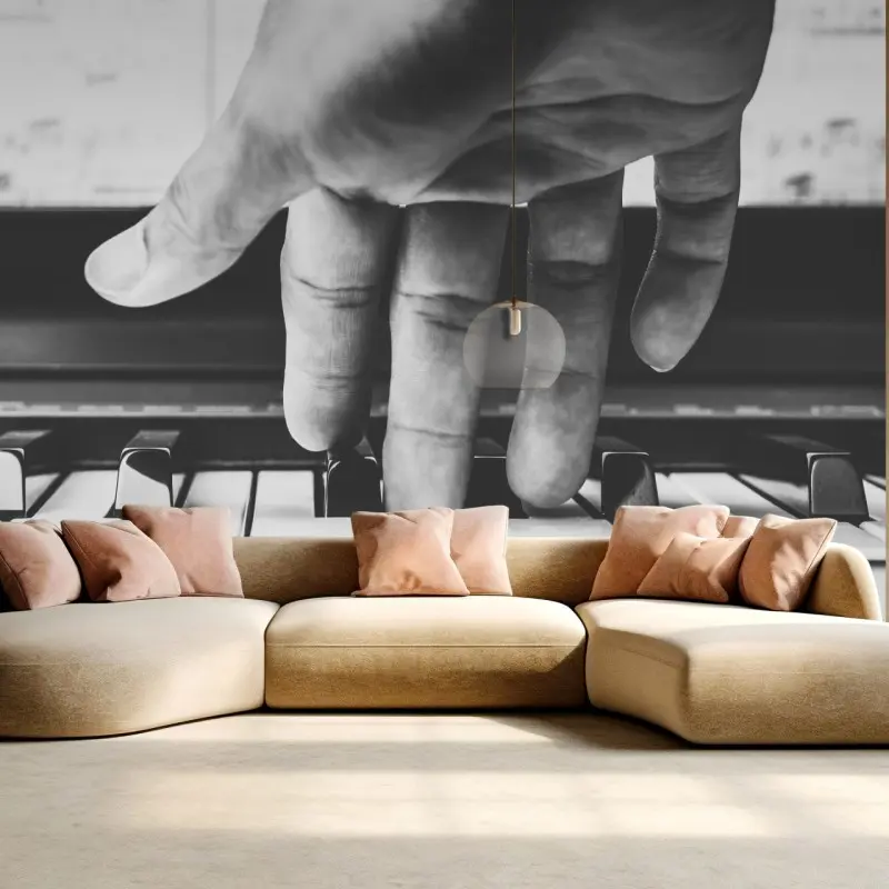 Fototapete hand auf klaviertasten