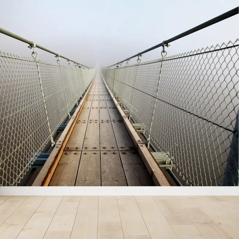 Fototapete neblige hängebrücke die in den nebel führt