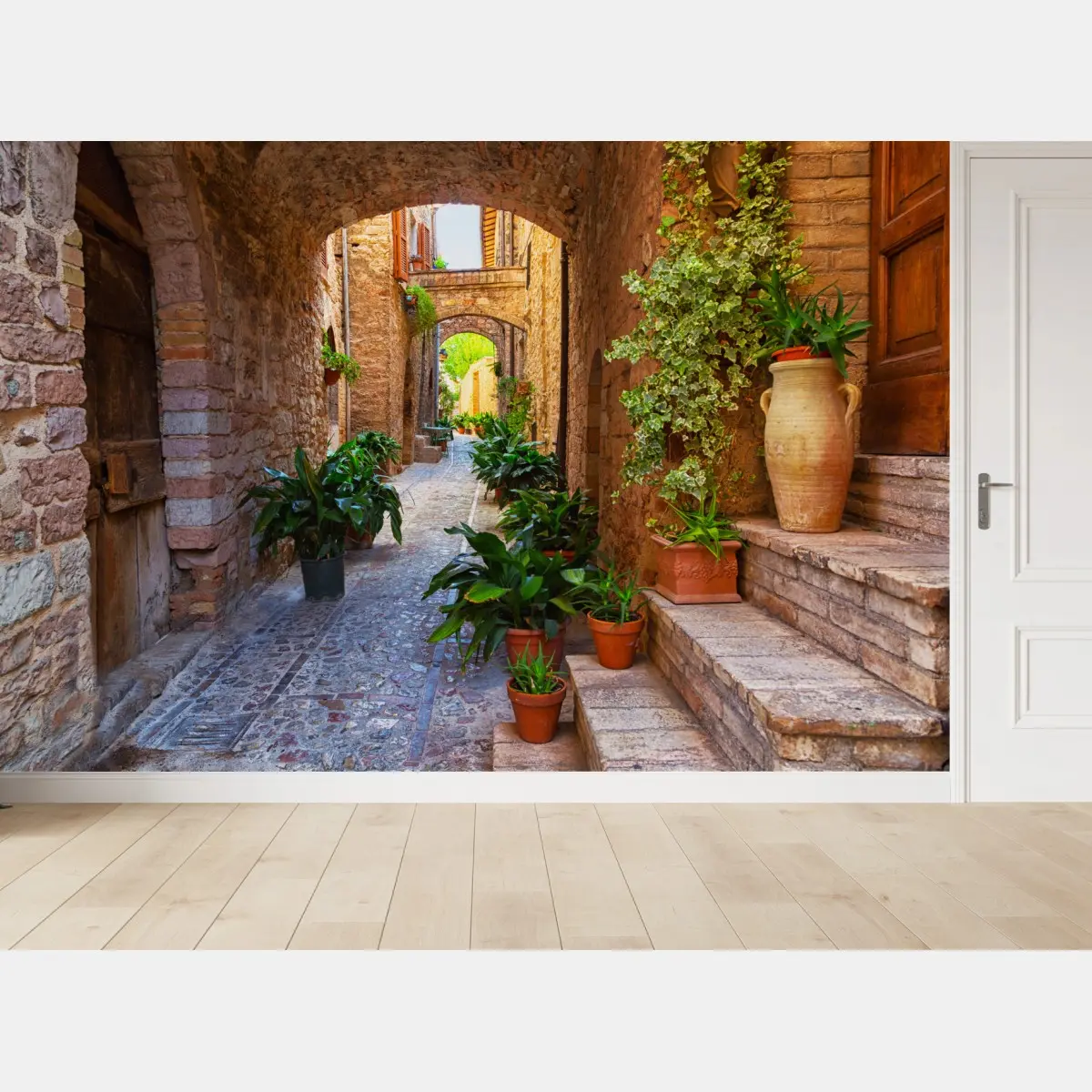 Fototapete sonnige gasse mit blumentöpfen in Spello – Pixers®