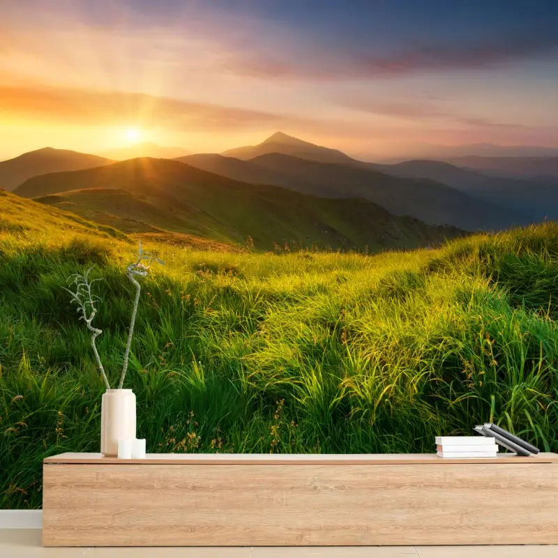 Fototapete sonnenaufgang über dem smaragdgrünen bergtal