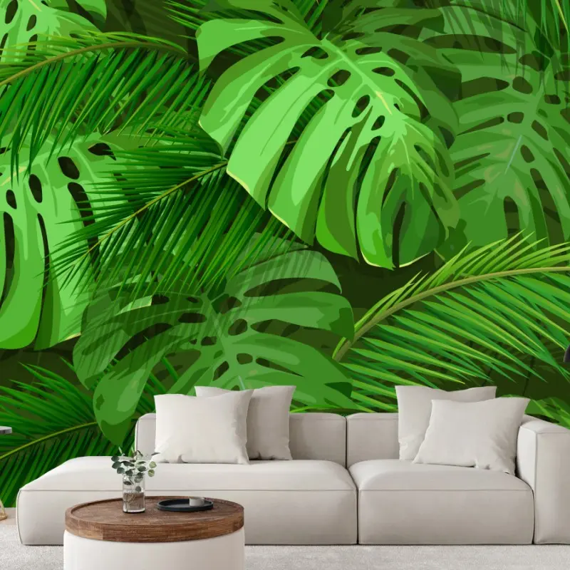 Fototapete üppige tropische monstera- und palmenblätter