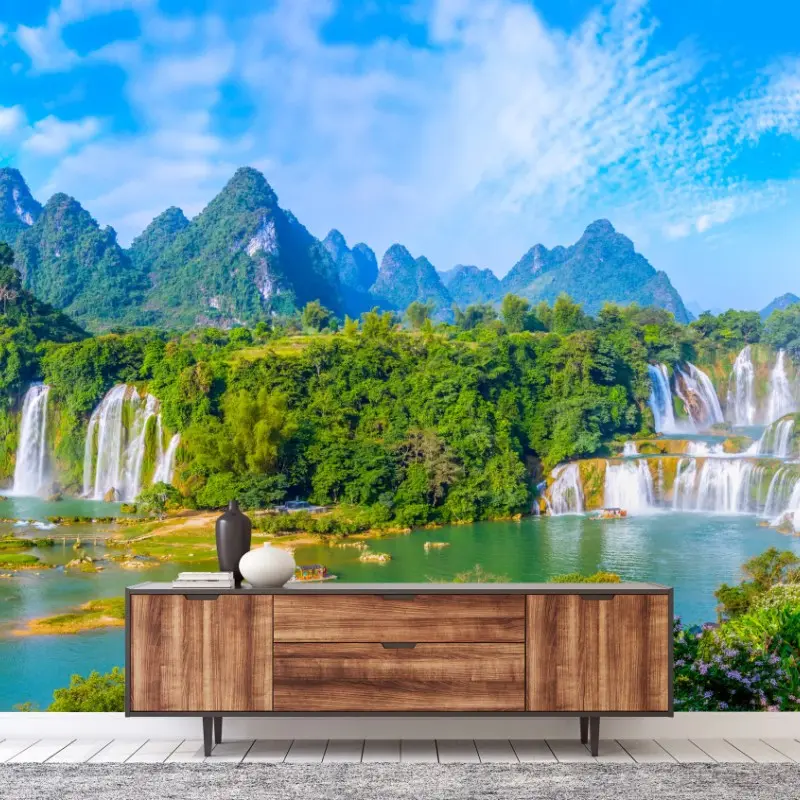 Fototapete üppige panoramaansicht eines wasserfalls mit karstbergen