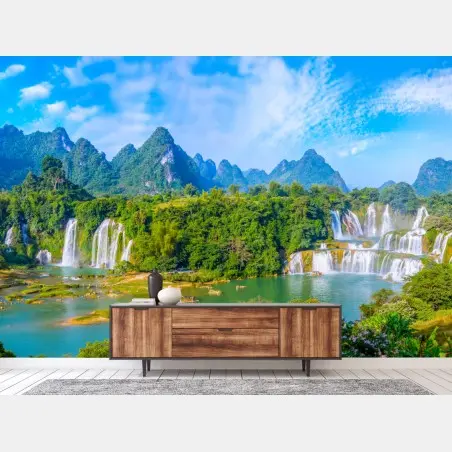 Fototapete üppige panoramaansicht eines wasserfalls mit karstbergen – Pixers®