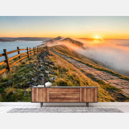 Fototapete sonnenaufgang über einem nebligen bergrücken mit steinweg – Pixers®