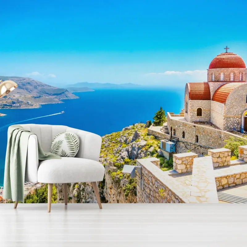 Fototapete griechische kirche auf klippe über dem meer
