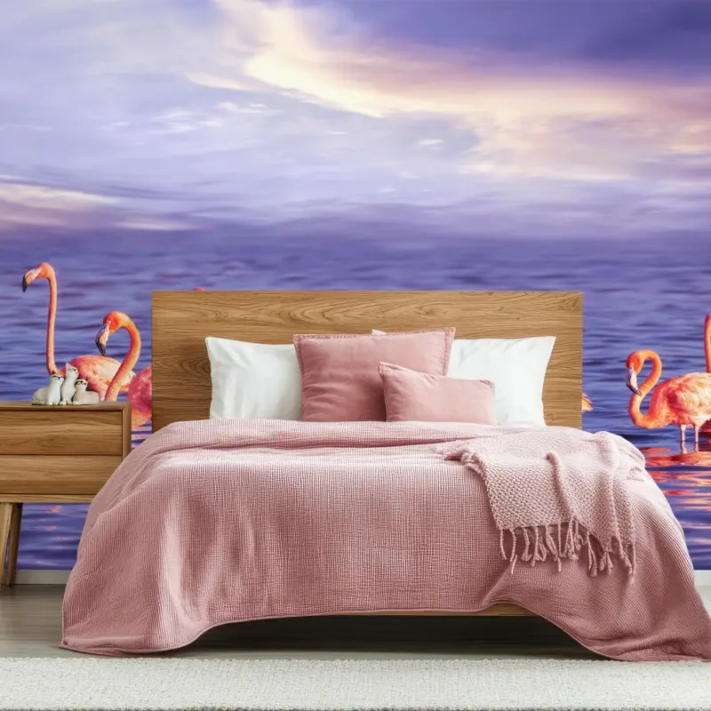 Fototapete rosa flamingos im violetten sonnenuntergang