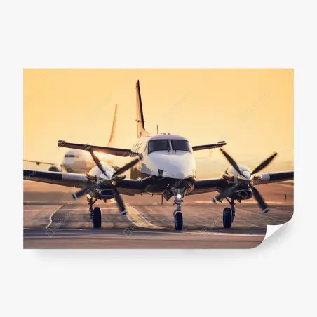 Fototapete zweimotoriges turboprop auf dem goldenen flugfeld – Pixers®