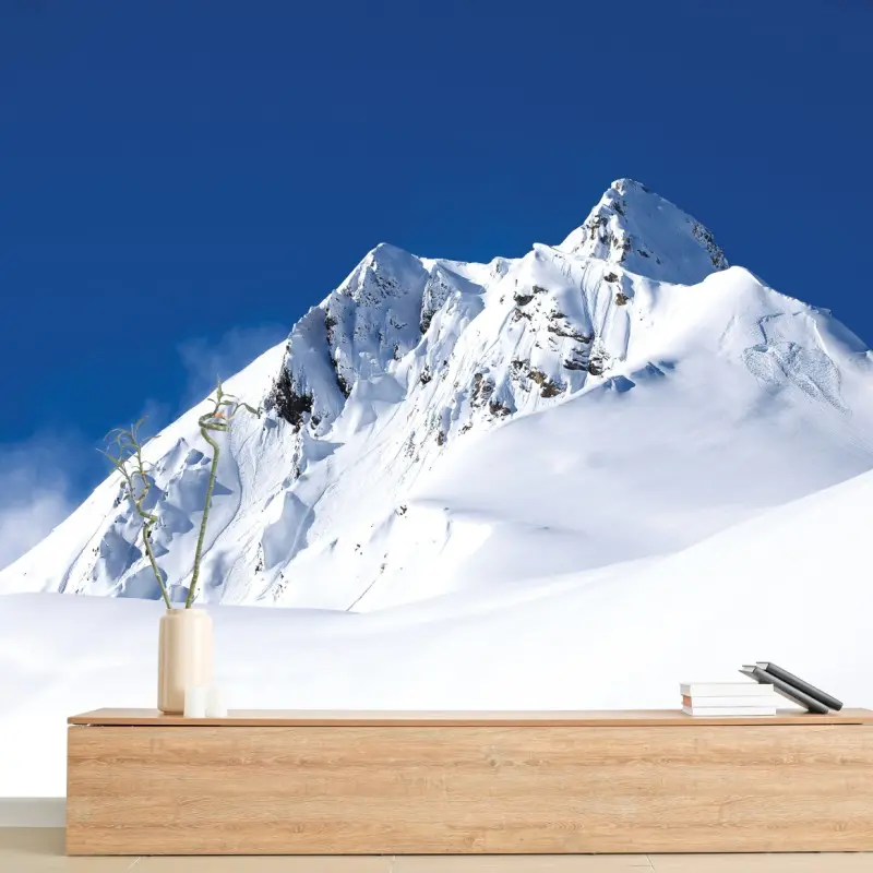 Fototapete verschneite alpenspitze unter tiefblauem himmel