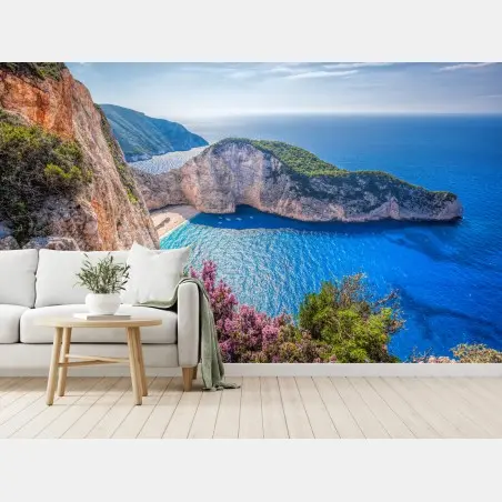Fototapete Navagio strand sonnenuntergang mit türkisblauem meer und wildblumen – Pixers®