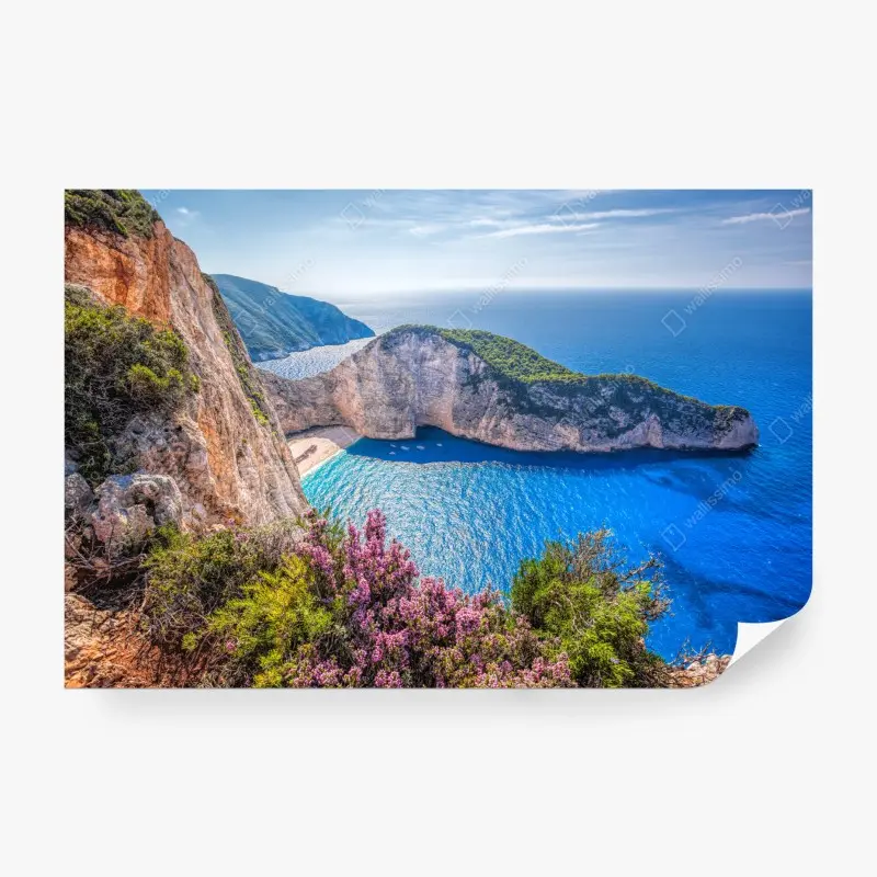 Fototapete Navagio strand sonnenuntergang mit türkisblauem meer und wildblumen