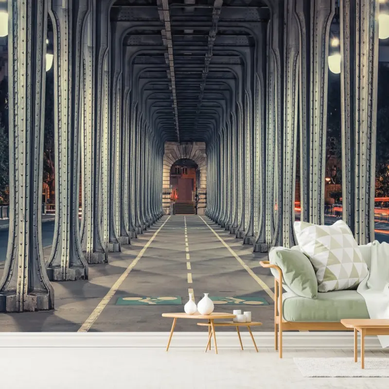 Fototapete symmetrischer stahlkorridor einer brücke bei nacht