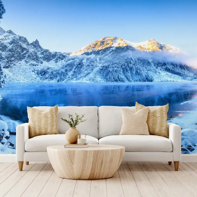 Fototapete winterlicher sonnenaufgang über dem gefrorenen bergsee