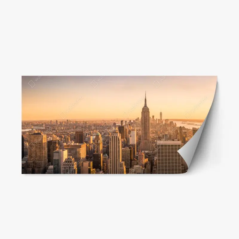 Repositionierbarer Aufkleber goldener sonnenuntergang über der skyline von New York