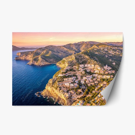 Repositionierbarer Aufkleber sonnenuntergang über küstenlandschaft mit dorf am kliff – Pixers®
