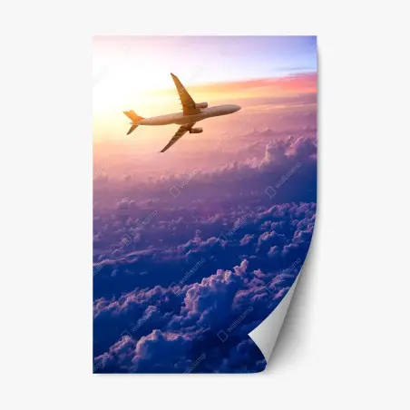Repositionierbarer Aufkleber flugzeug über den wolken bei sonnenaufgang – Pixers®
