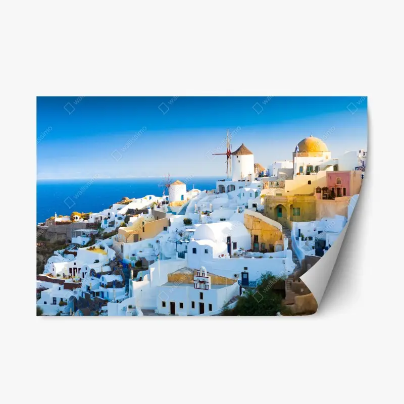 Repositionierbarer Aufkleber sonnenbeschienenes Santorini-dorf am meer
