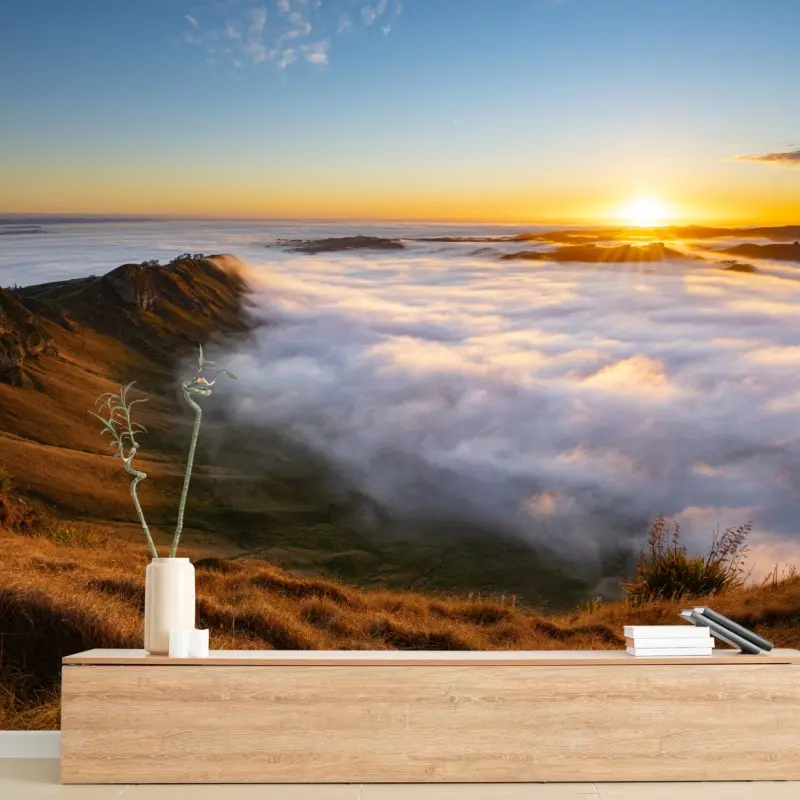 Fototapete sonnenaufgang über nebeligem bergtal