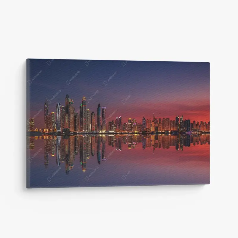 Leinwandbild stadtpanorama bei sonnenuntergang mit spiegelung