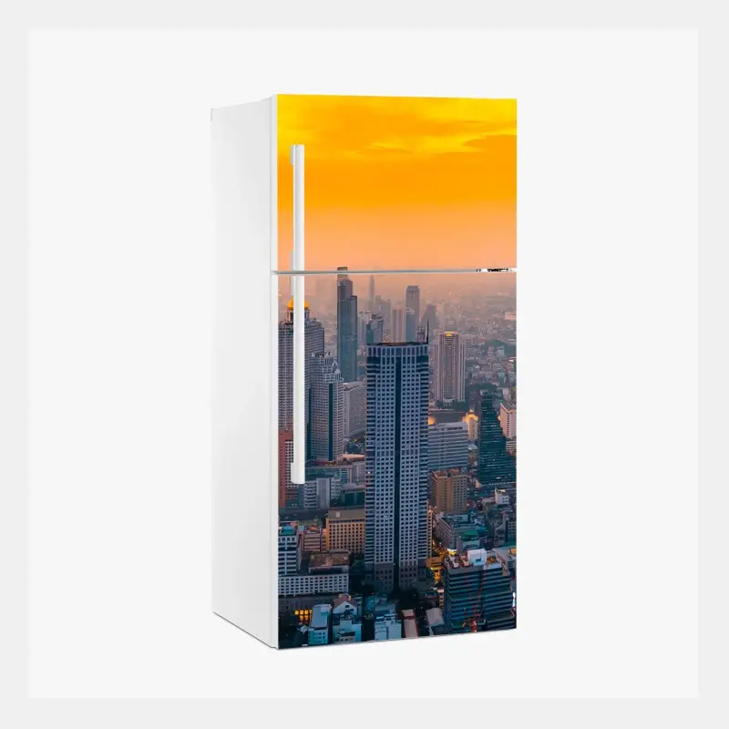 Kühlschrankaufkleber goldene stadtsilhouette bei sonnenuntergang