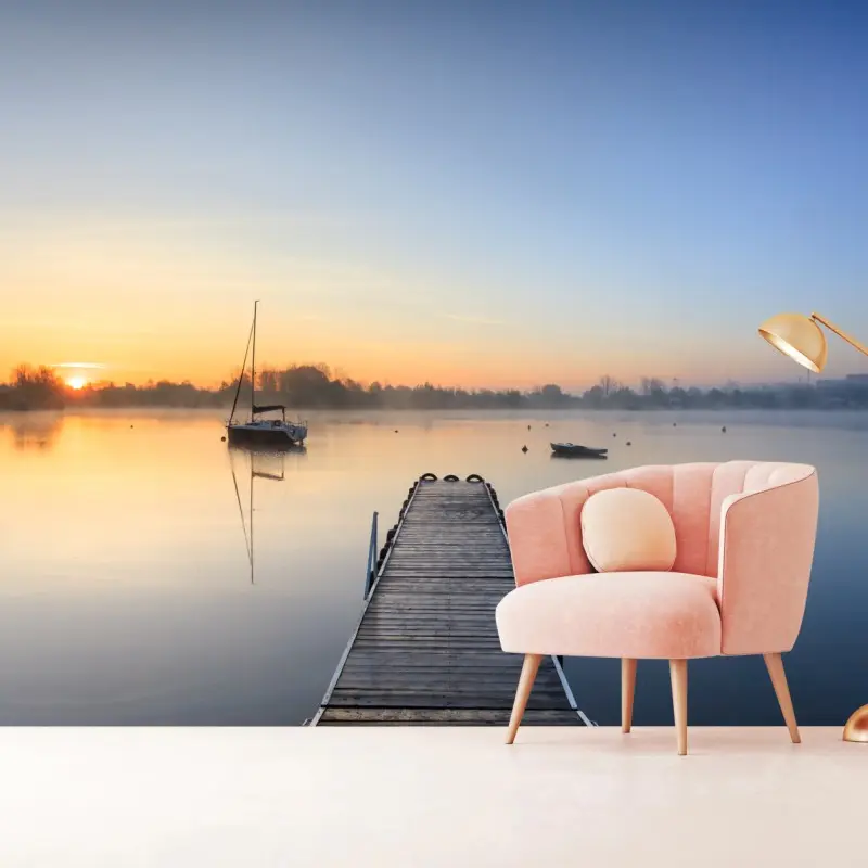 Fototapete ruhiger sonnenaufgang über nebligem see
