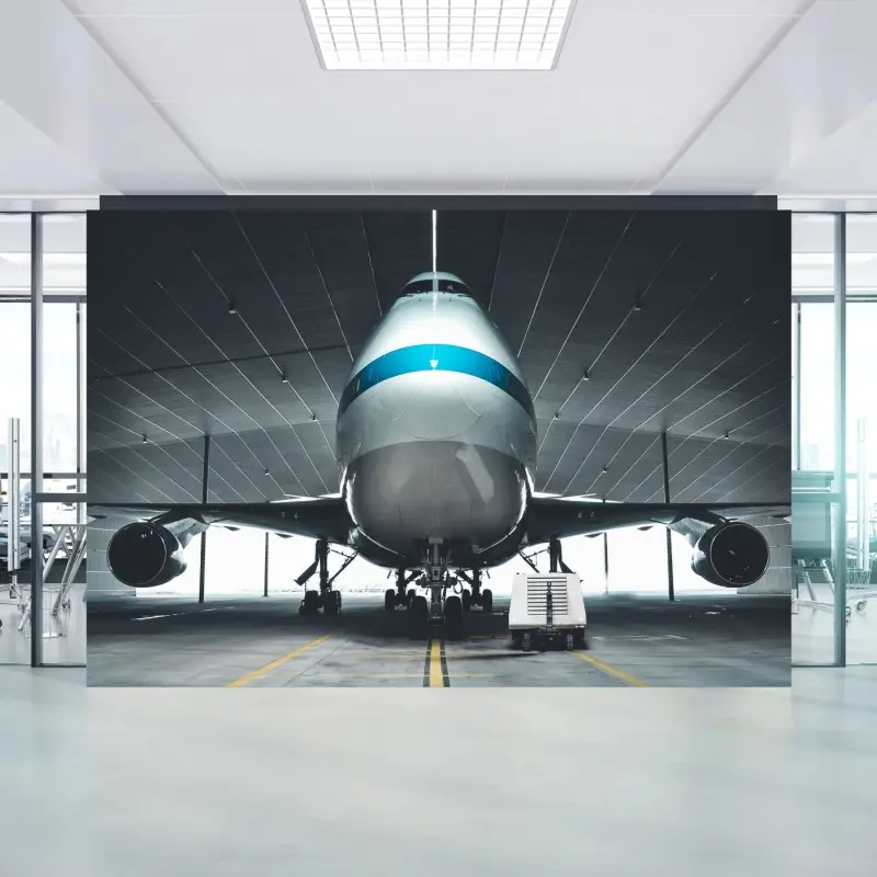 Fototapete frontansicht eines jets im hangar