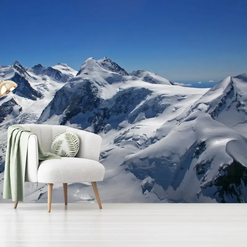 Fototapete schneebedeckte Alpenberge unter klarem blauem himmel