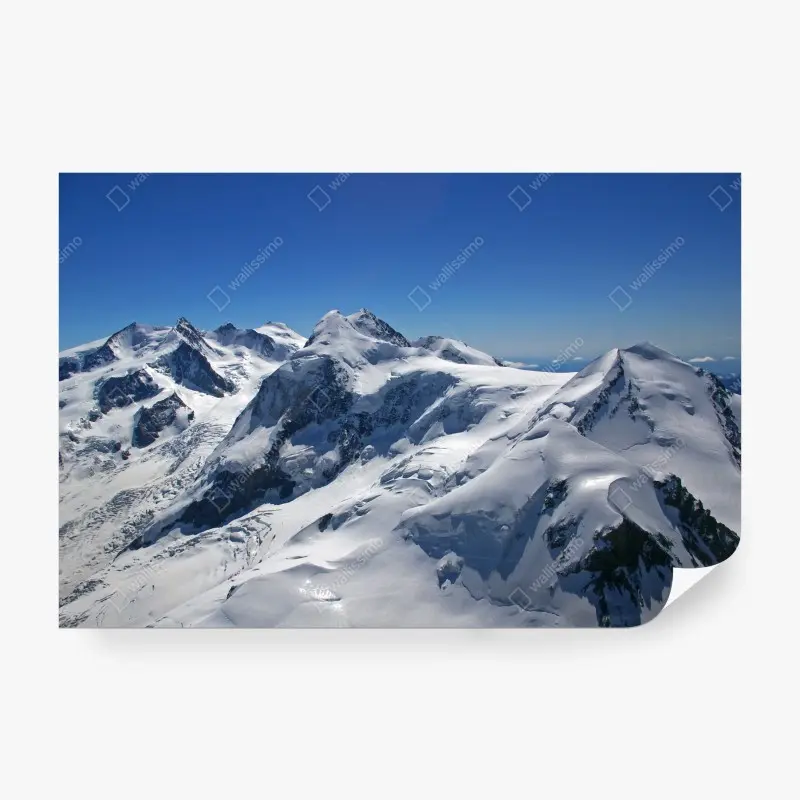 Fototapete schneebedeckte Alpenberge unter klarem blauem himmel