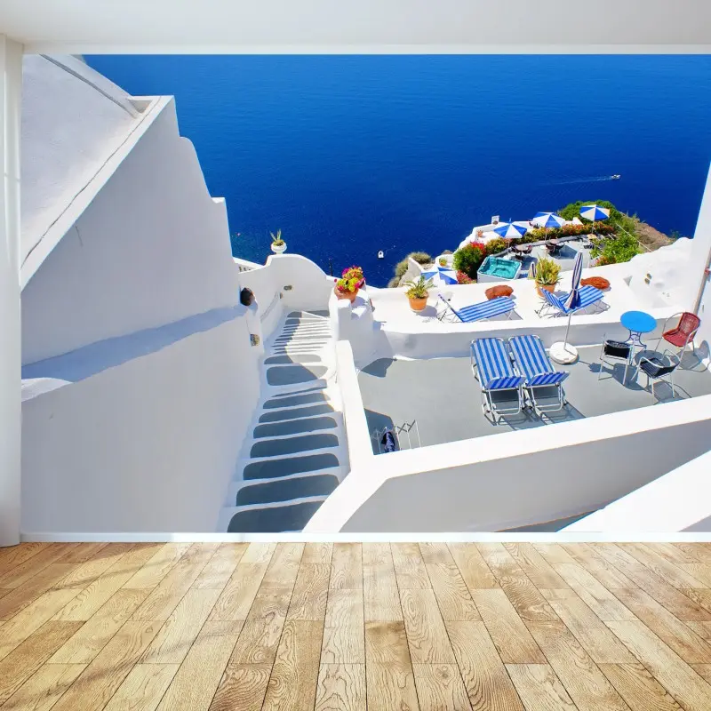 Fototapete Santorini weiße terrassen über dem tiefblauen meer