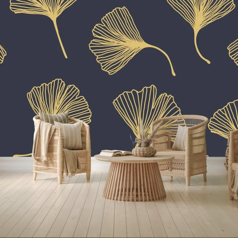 Fototapete goldene ginkgoblätter auf marineblauem hintergrund