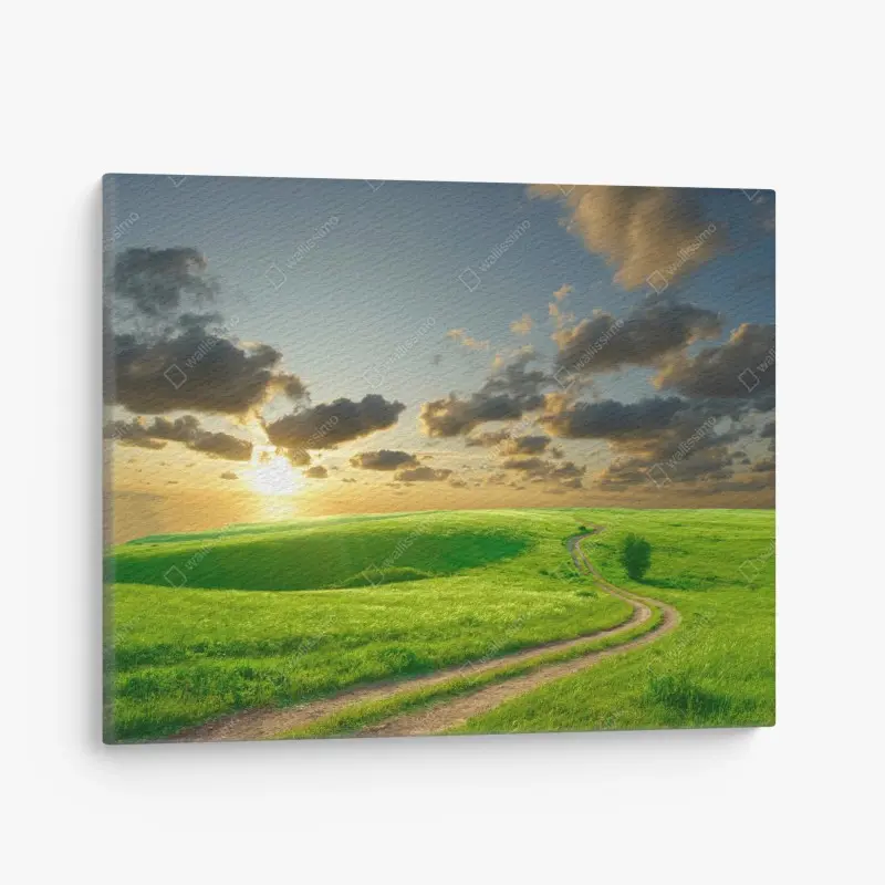 Leinwandbild sonnenuntergang über geschwungener grüner wiese